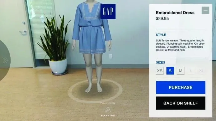 A computer simulation of a female model trying on a blue embroidered dress. 